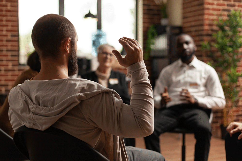 Group-discussing-addiction Group discussing addiction