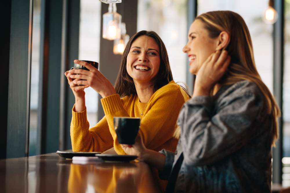 Friends meeting in coffee shop