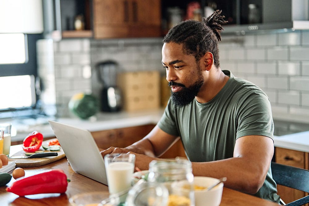 Man reading about three strategies to boost healthy eating