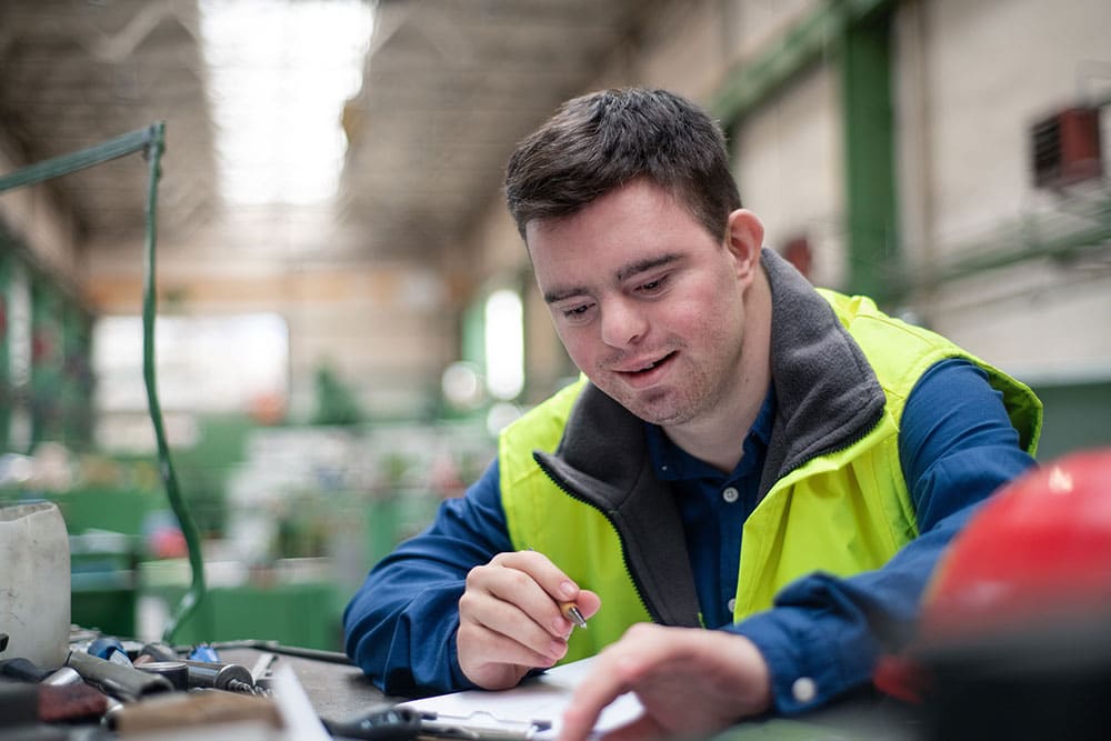 Person supported at work with reasonable adjustments
