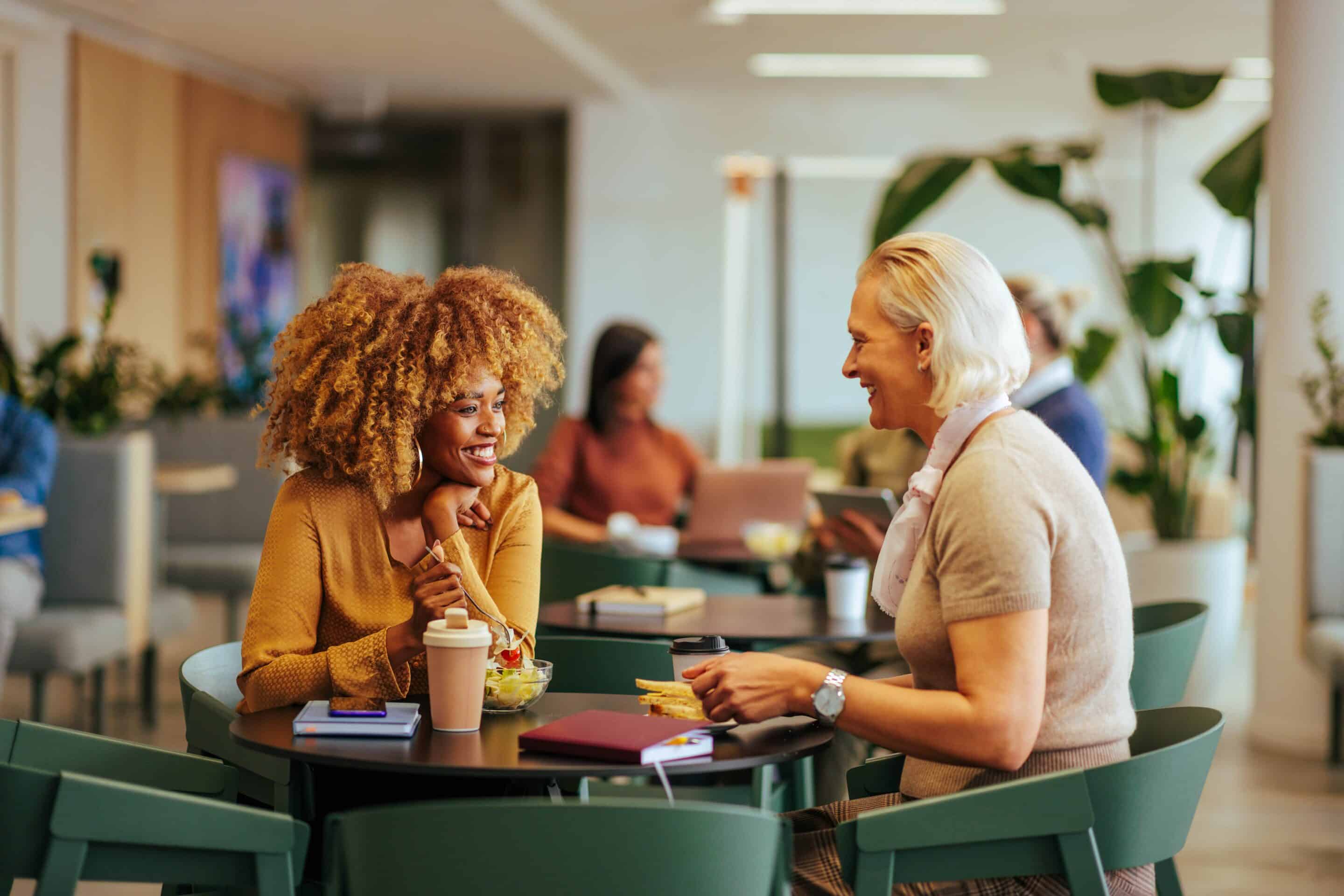 AdobeStock_567172303-min Two employees having lunch together