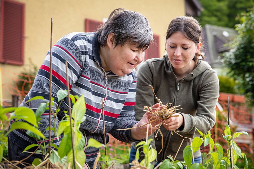 Person caring for family member around work duties